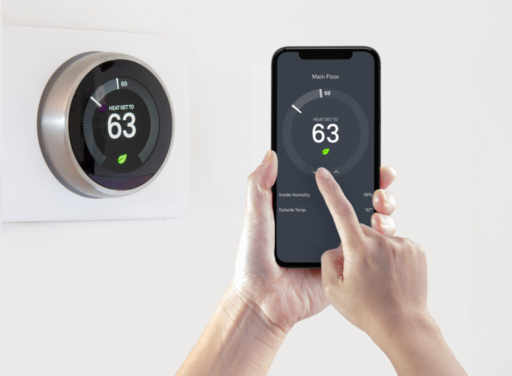 Smart Thermostat linking up with someones home to save on energy Laureyns United